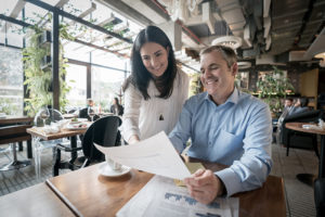 Man happily getting a small business loan