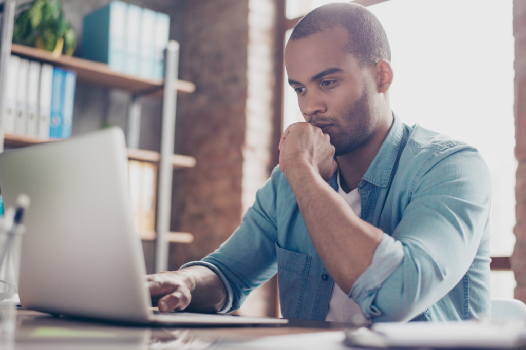 Man using laptop for business