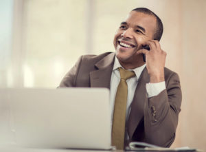 smiling-african-american-businessman-on-the-phone