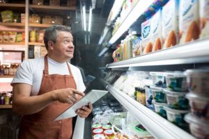 Man working at a grocery store