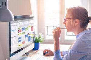 Featured image of a white woman looking at a computer