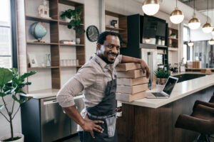 Feature image of a black business owner smiling