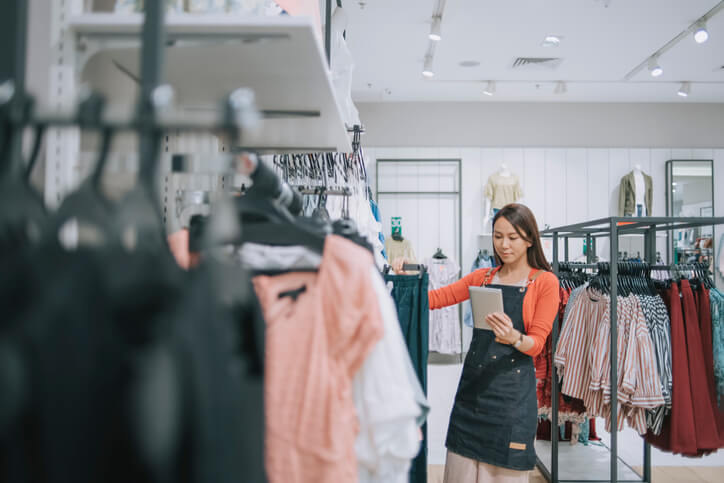 Woman taking inventory at retail store