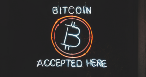 A sign reading: "Bitcoin accepted here."