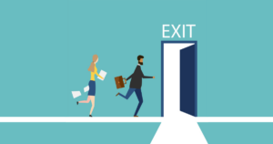 An image of two workers going to an Exit sign