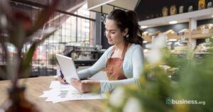 Business owner looking at tablet