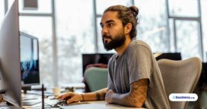 person-sitting-at-desk-working-in-office