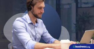 man with headset using laptop