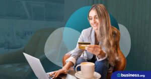 person using credit card and drinking coffee on abstract background