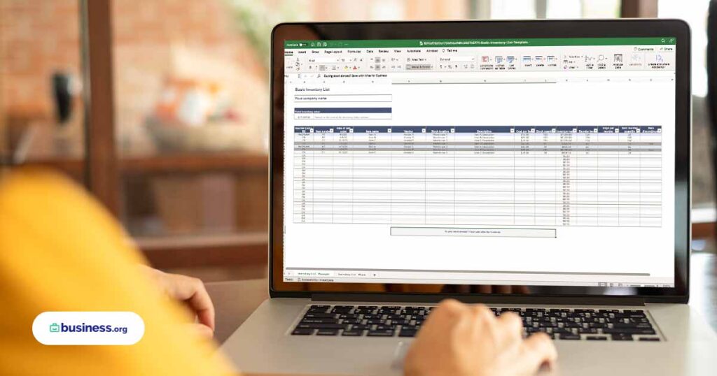 excel spreadsheet managing inventory on laptop