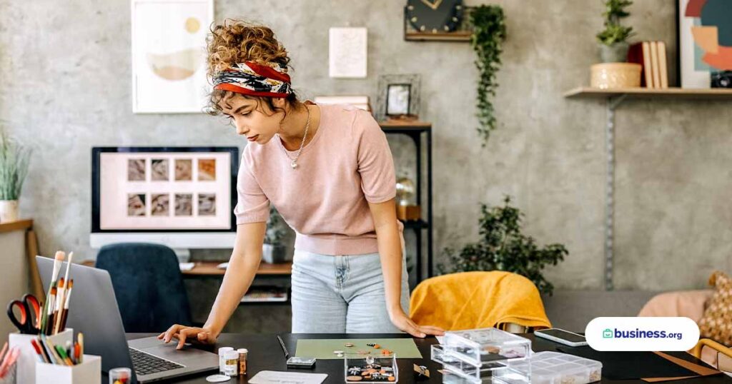 woman in small office using computer