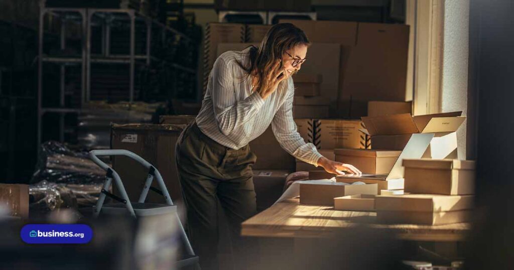 worker-surrounded-by-boxes-signing-loan