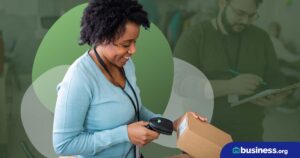 Lady using a scanner to scan a box